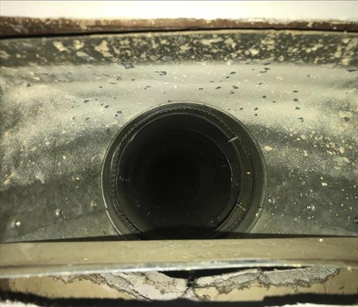 Yellow stains around the opening of an air duct
